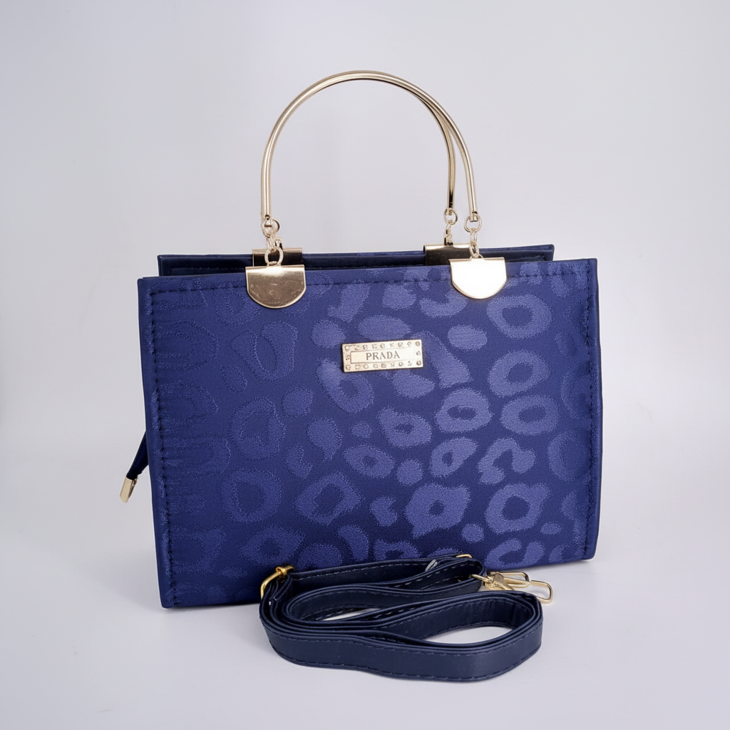 Navy blue luxury handbag with white background